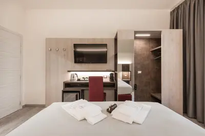 Letto o letti in una camera di Le Nove Muse Guesthouse