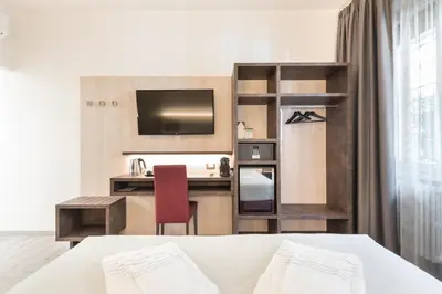 Letto o letti in una camera di Le Nove Muse Guesthouse