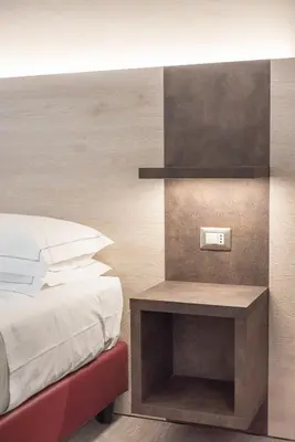 Letto o letti in una camera di Le Nove Muse Guesthouse