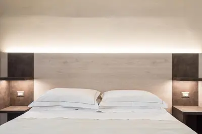 Letto o letti in una camera di Le Nove Muse Guesthouse