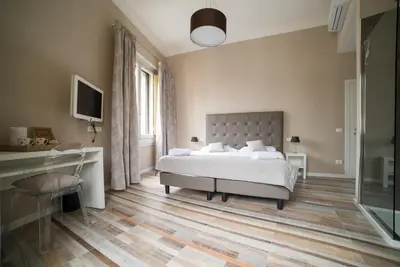 Letto o letti in una camera di D'HOME FLORENCE