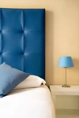 Letto o letti in una camera di D'HOME FLORENCE
