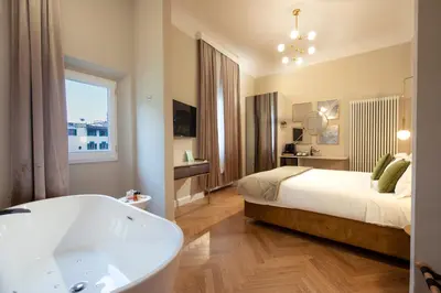 Letto o letti in una camera di Ricasoli Garden Relais