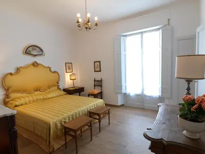 Letto o letti in una camera di Giardino D'Azeglio Locazione Turistica