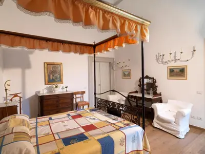 Letto o letti in una camera di Giardino D'Azeglio Locazione Turistica