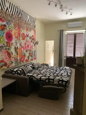 Letto o letti in una camera di Scala Family Home