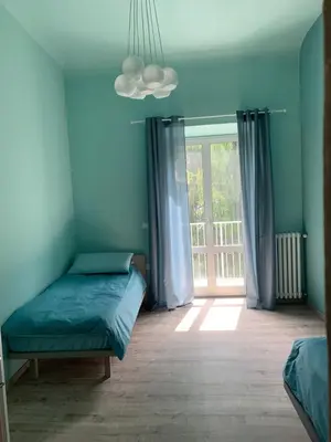 Letto o letti in una camera di Scala Family Home