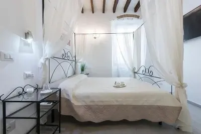 Letto o letti in una camera di Little box house