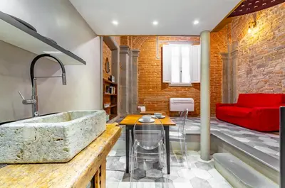 Area soggiorno di GuestHost - Florence Oltrarno Duplex Apartment