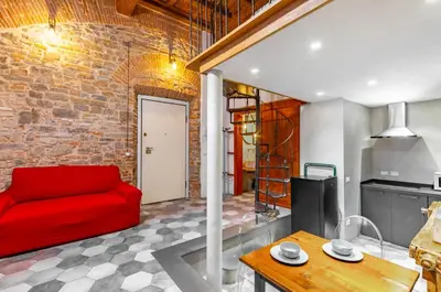 Area soggiorno di GuestHost - Florence Oltrarno Duplex Apartment