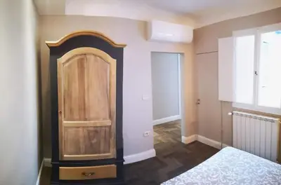 Letto o letti in una camera di lacasadicavour Duomo Apt