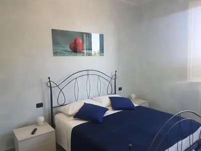 Letto o letti in una camera di Piccolo Poggio Apartments
