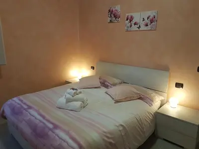 Letto o letti in una camera di Piccolo Poggio Apartments