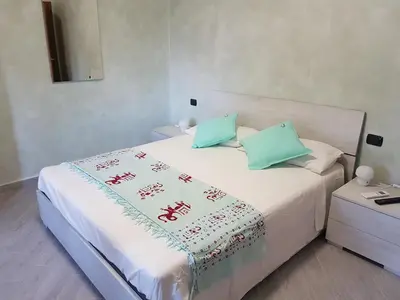 Letto o letti in una camera di Piccolo Poggio Apartments