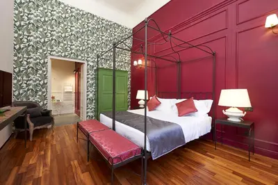 Letto o letti in una camera di Peruzzi Urban Residences