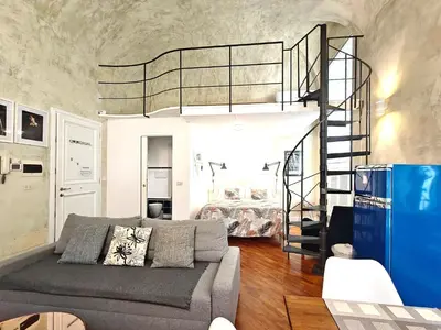Area soggiorno di Chic Mamma Deluxe Loft Suite
