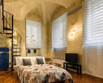 Letto o letti in una camera di Chic Mamma Deluxe Loft Suite