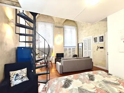 Letto o letti in una camera di Chic Mamma Deluxe Loft Suite