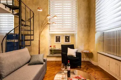 Area soggiorno di Chic Mamma Deluxe Loft Suite