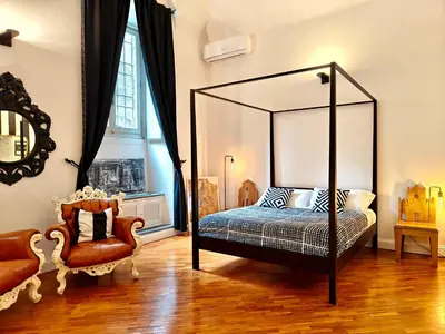 Letto o letti in una camera di Chic Mamma Luxury Loft Suite