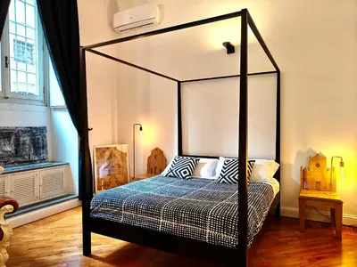 Letto o letti in una camera di Chic Mamma Luxury Loft Suite