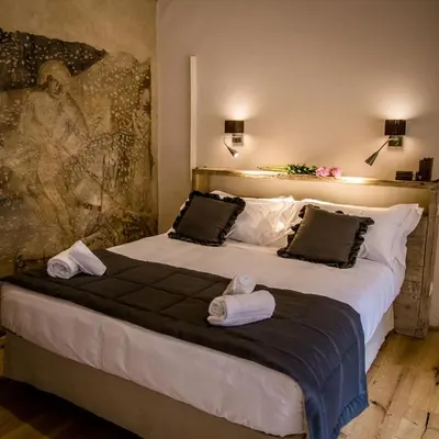 Letto o letti in una camera di San Pier Novello in Oltrarno