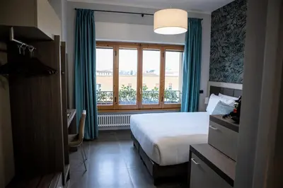 Letto o letti in una camera di G&G FIRENZE SUITES b&b