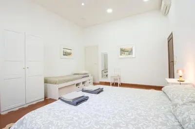 Letto o letti in una camera di Il Villino Rosa Apartment