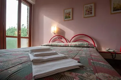 Letto o letti in una camera di Hotel Le Terrazze di Nappino