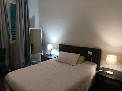 Letto o letti in una camera di B&Big Prato
