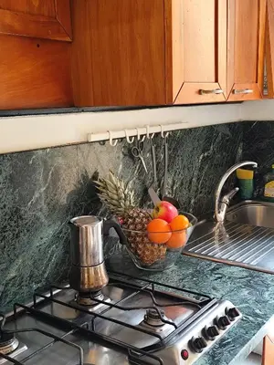 Cucina o angolo cottura di BORGO SAN FREDIANO SUITES