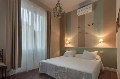 Letto o letti in una camera di Ricasoli Charme