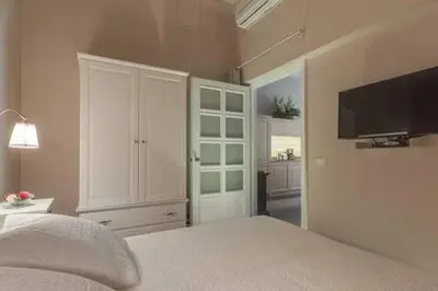 Letto o letti in una camera di Ricasoli Charme