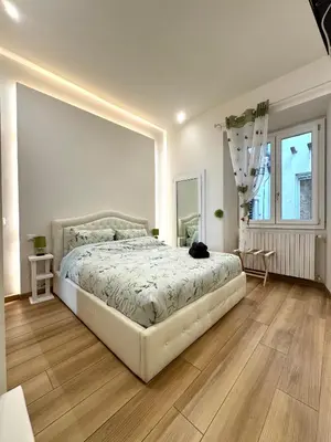 Letto o letti in una camera di Relais Bargello Suite