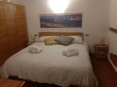 Letto o letti in una camera di Porcellana Twenty-Six Florence Wi-Fi Apartment
