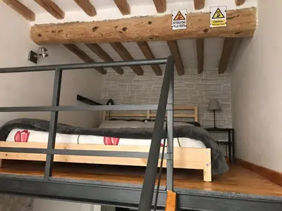 Letto o letti in una camera di Il nido - Cozy studio apartment in Santa Croce