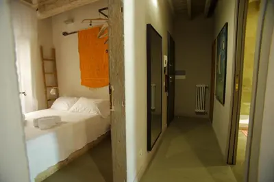 Letto o letti in una camera di Oasis in the heart of Florence