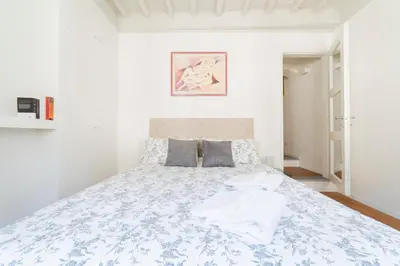 Letto o letti in una camera di San Niccolò hidden gem suite