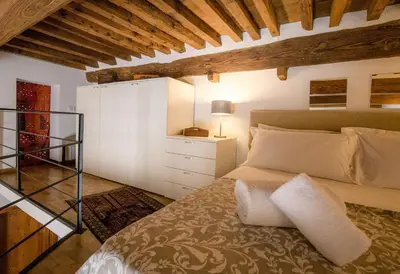 Letto o letti in una camera di Acacia Firenze - Te Verde