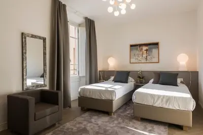 Letto o letti in una camera di Apartments Florence - Duomo Contemporary