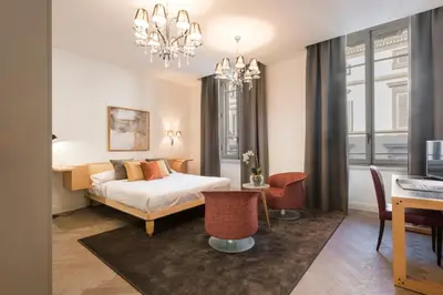 Letto o letti in una camera di Apartments Florence - Duomo Contemporary