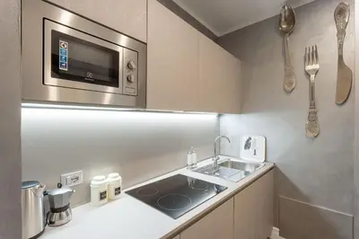 Cucina o angolo cottura di DUOMO SUITE GHIRLANDAIO