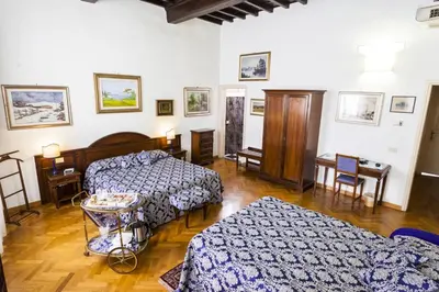 Letto o letti in una camera di Soggiorno Antica Torre