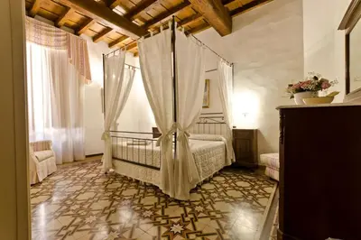 Letto o letti in una camera di La Signoria