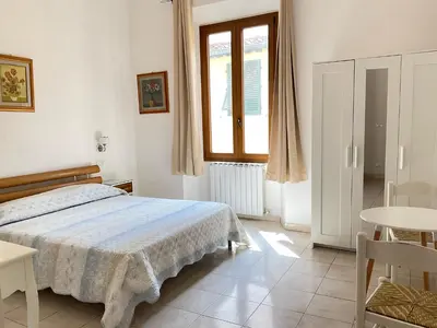 Letto o letti in una camera di Affittacamere Vanessa