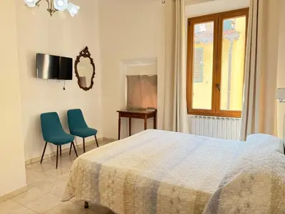 Letto o letti in una camera di Affittacamere Vanessa