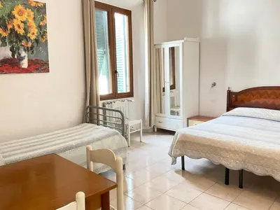 Letto o letti in una camera di Affittacamere Vanessa