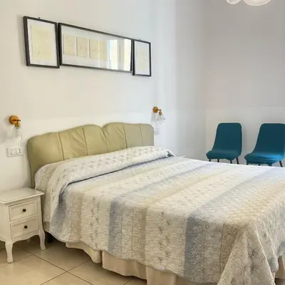 Letto o letti in una camera di Affittacamere Vanessa