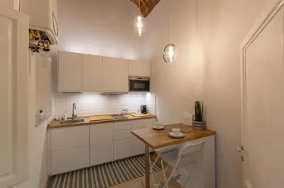 Cucina o angolo cottura di FLORENCE FIORINO APARTMENT
