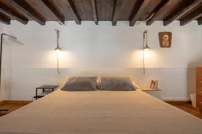 Letto o letti in una camera di Serragli Loft by Mmega